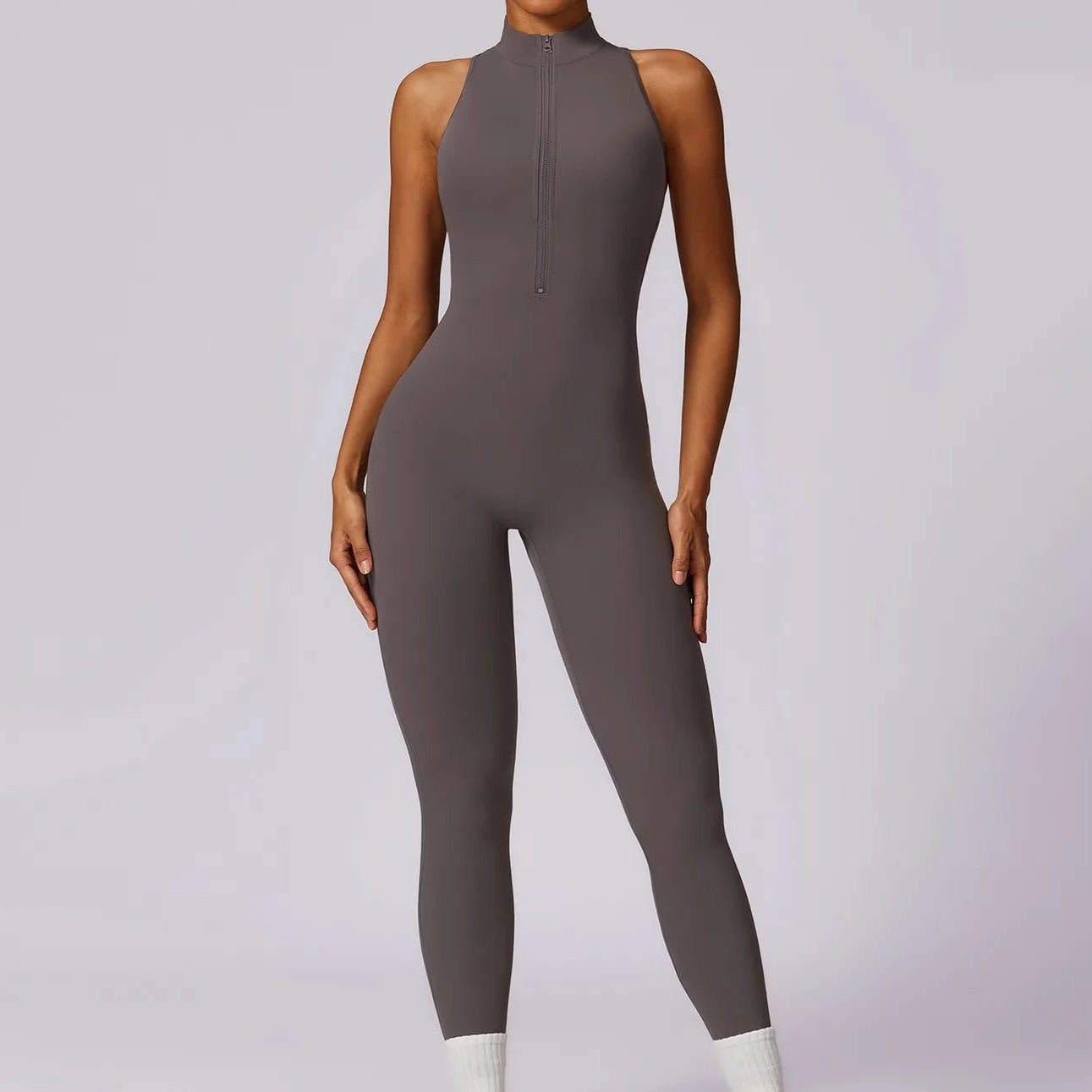 SCULPTING HIGH-NECK JUMPSUIT